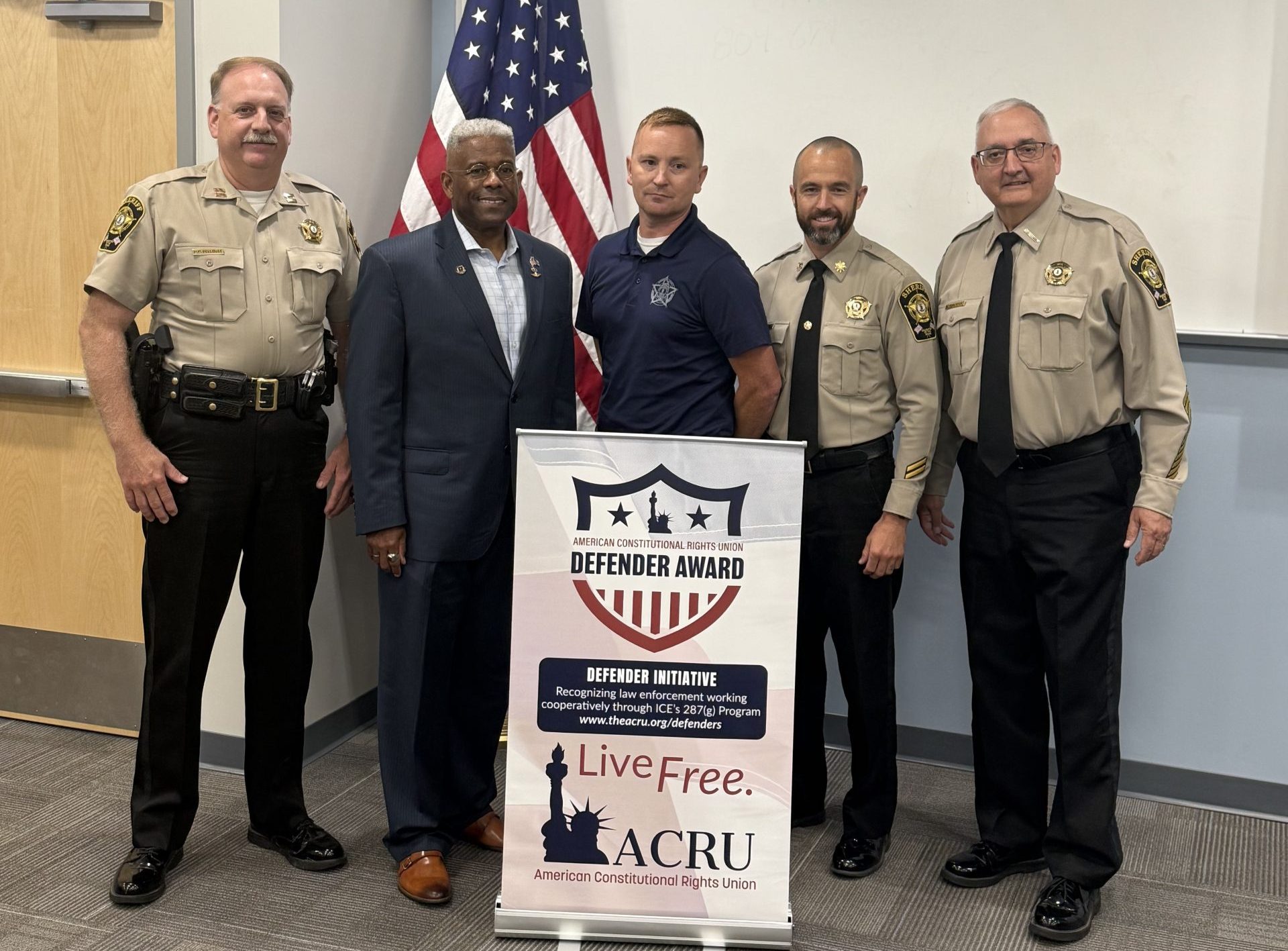 ACRU Exec Dir Lt Col Allen West with Sheriff Carter and Officers