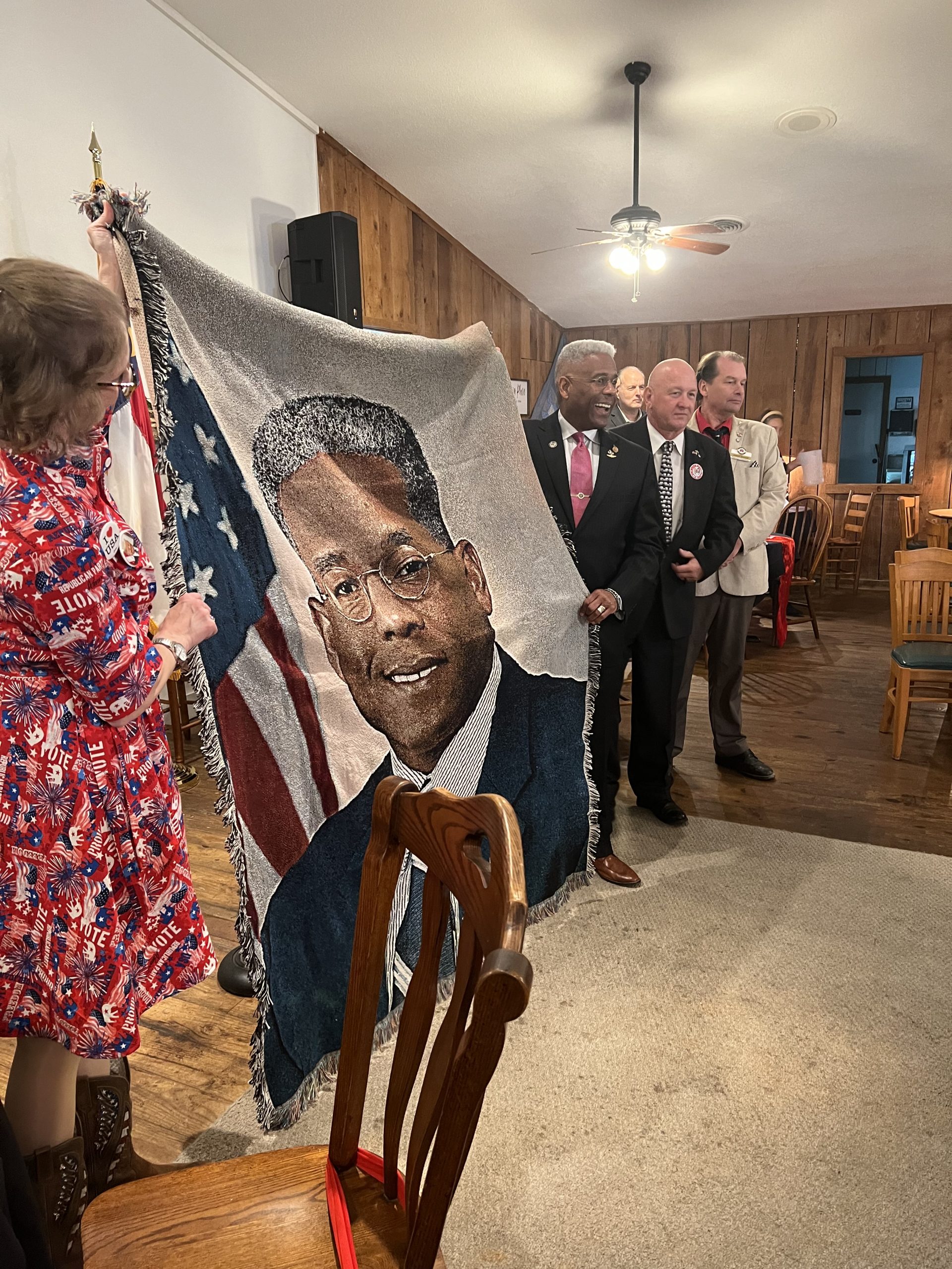 Lt Col Allen West accepting a wonderful tapestry in his likeness.